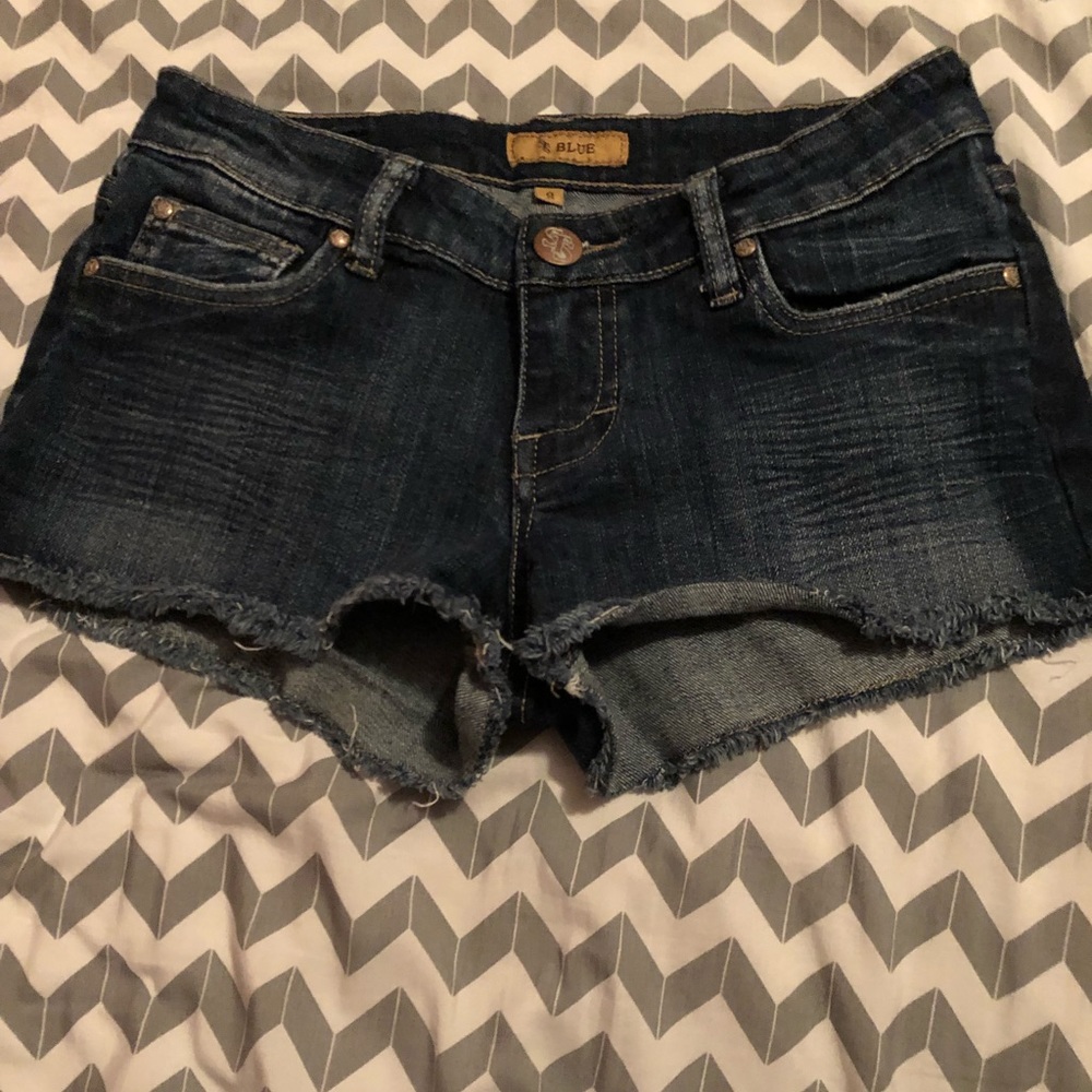 Distressed denim shorts